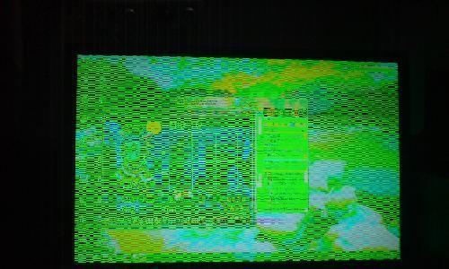如何解决电脑显示器发绿发黄问题（简单有效的调整方法）